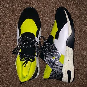 Neon green and black sneakers